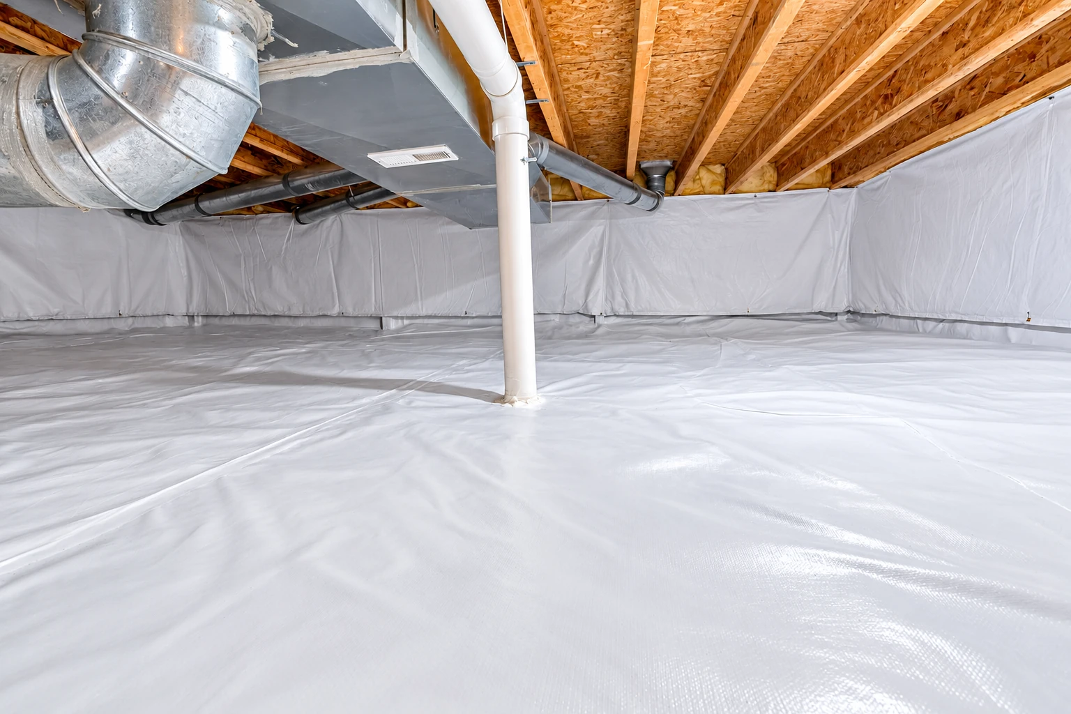 Crawl space with a white plastic vapor barrier covering the floor and lower walls beneath exposed joists and ductwork.
